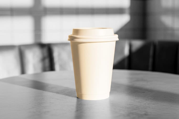 Coffee Cup Mockup on a Table